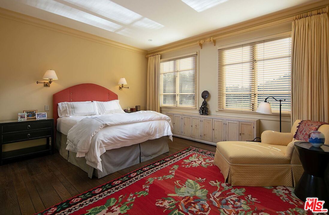 531 Barnaby Road Los Angeles, CA 90077 - Photo 19 of 28 a bedroom with bed and a window