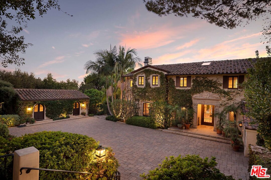 531 Barnaby Road Los Angeles, CA 90077 - Photo 2 of 28 a front view of a house with a yard