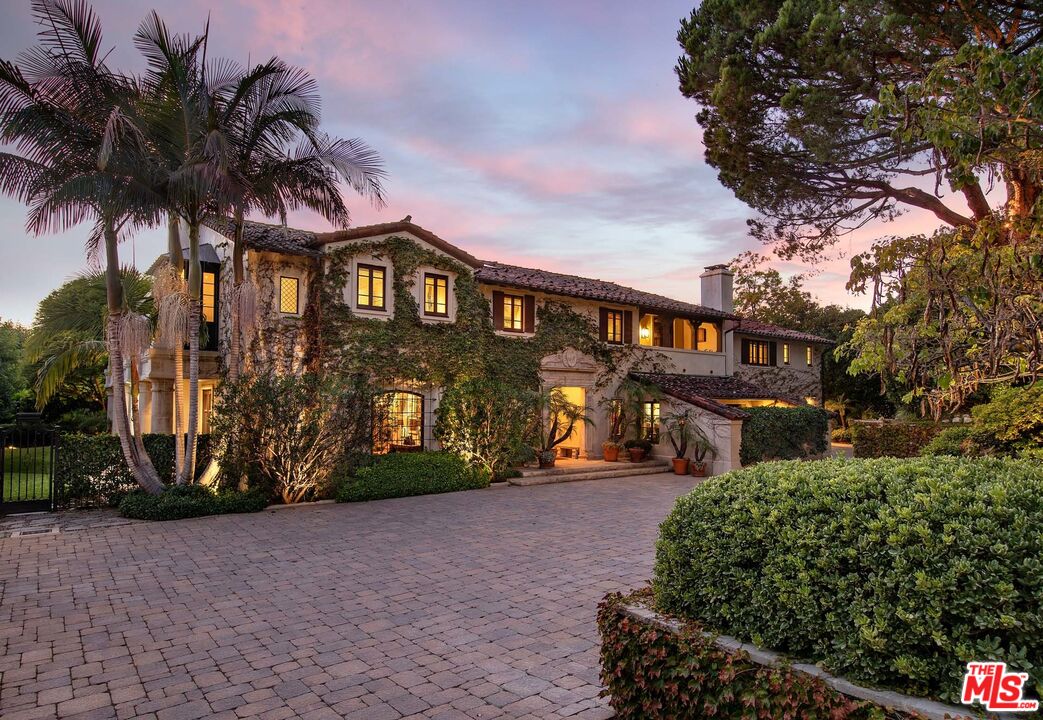 531 Barnaby Road Los Angeles, CA 90077 - Photo 3 of 28 a front view of a house with a yard