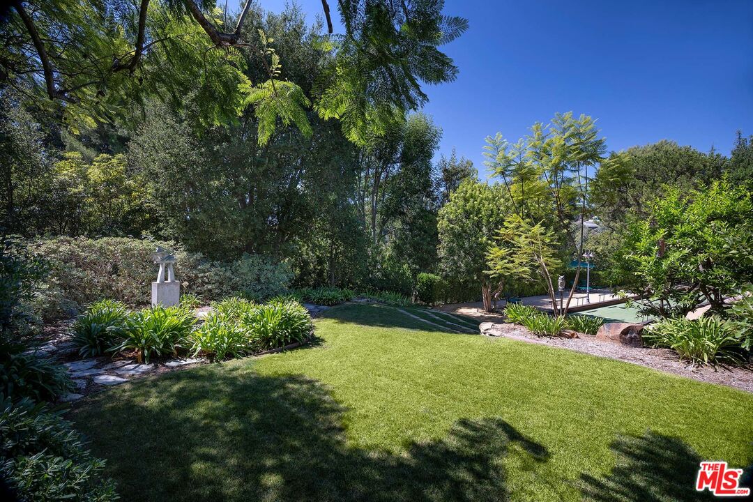 531 Barnaby Road Los Angeles, CA 90077 - Photo 5 of 28 a view of swimming pool and outdoor seating