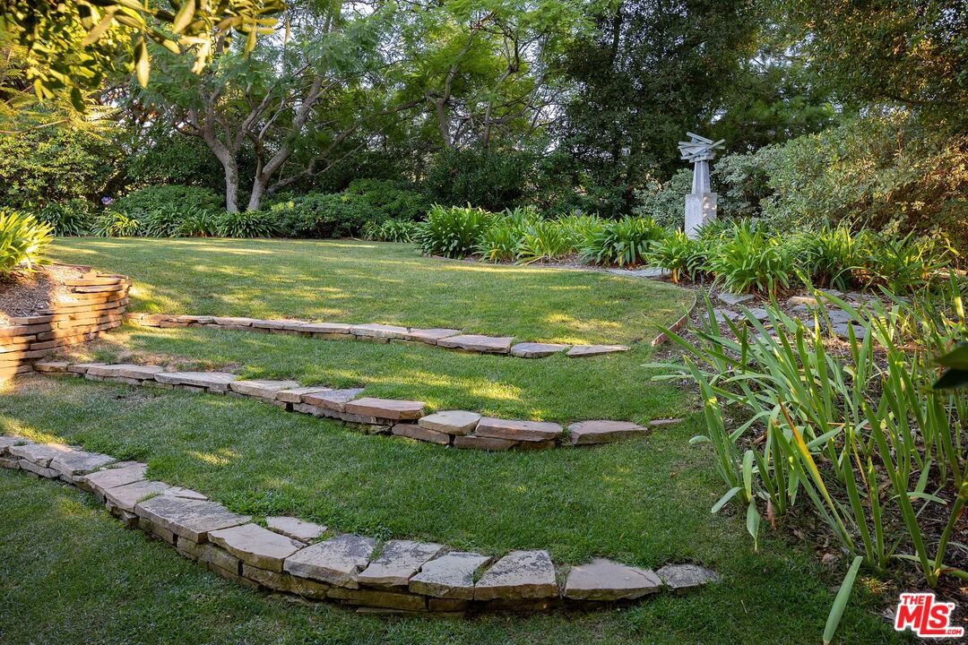 531 Barnaby Road Los Angeles, CA 90077 - Photo 7 of 28 a view of a golf course with a lake