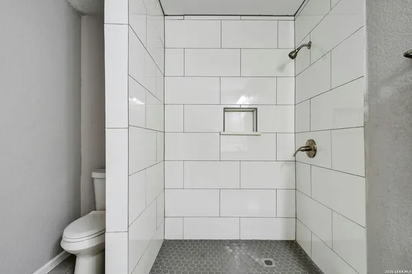 a bathroom with a toilet