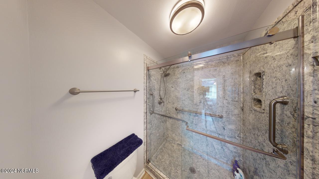 90 Clubhouse Road, Unit 6D Sunset Beach, NC 28468 - Photo 20 of 63 sliding glass door shower