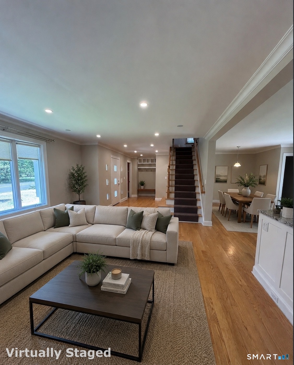 2182 North Benson Road Fairfield, CT 06824 - Photo 17 of 21 a living room with furniture and a wooden floor