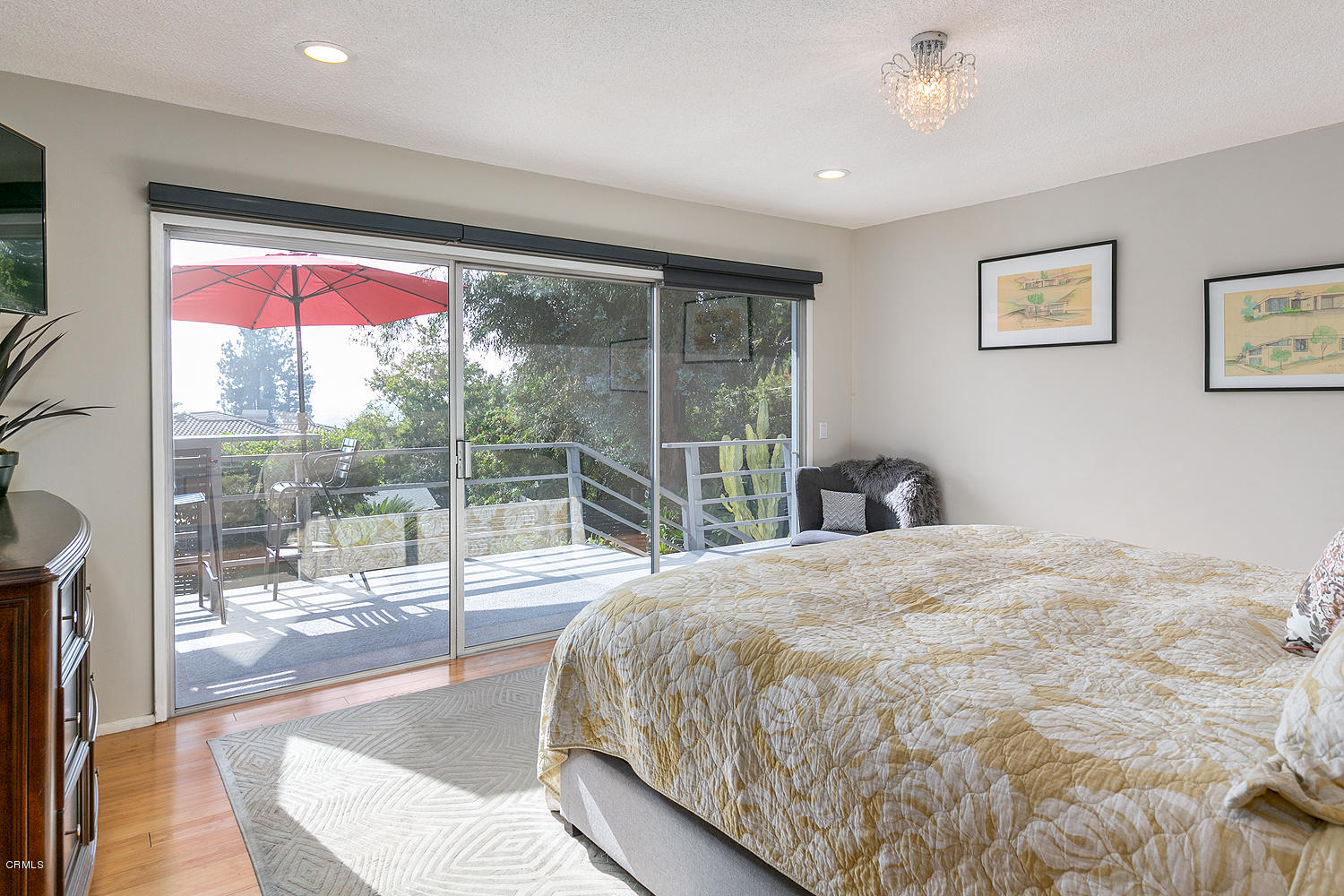 2044 Cricklewood Path Pasadena, CA 91107 - Photo 13 of 32 a bedroom with a large bed and a large window