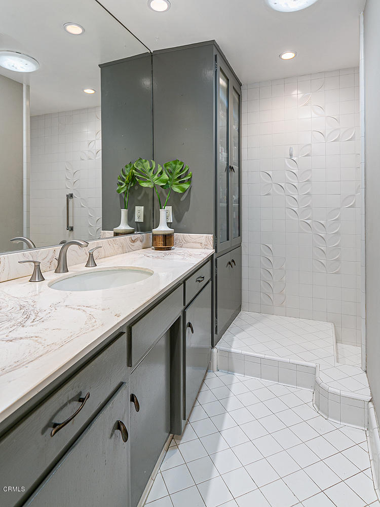 2044 Cricklewood Path Pasadena, CA 91107 - Photo 15 of 32 a bathroom with a double vanity sink toilet and shower