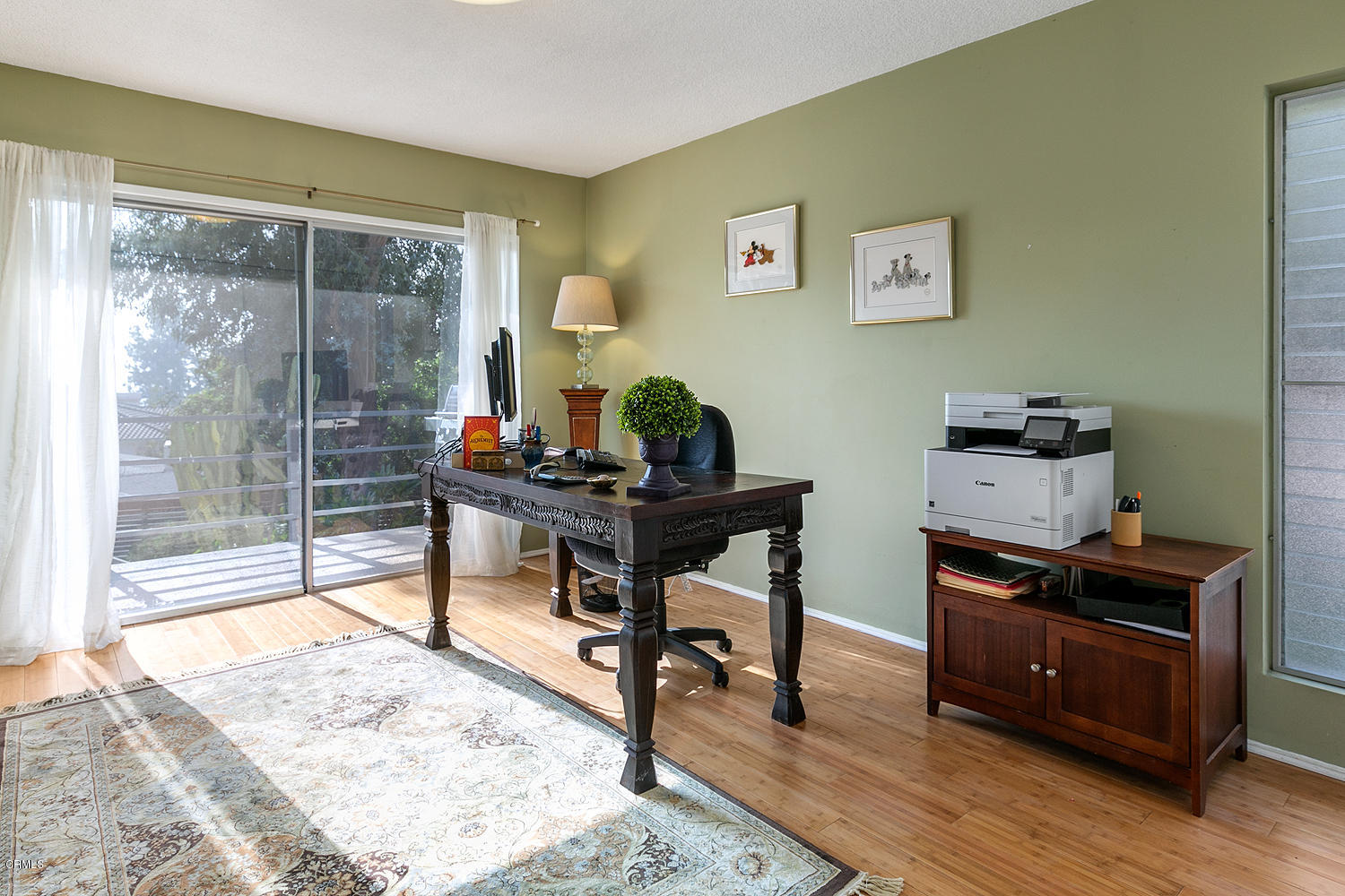 2044 Cricklewood Path Pasadena, CA 91107 - Photo 18 of 32 a view of a workspace with furniture and a window