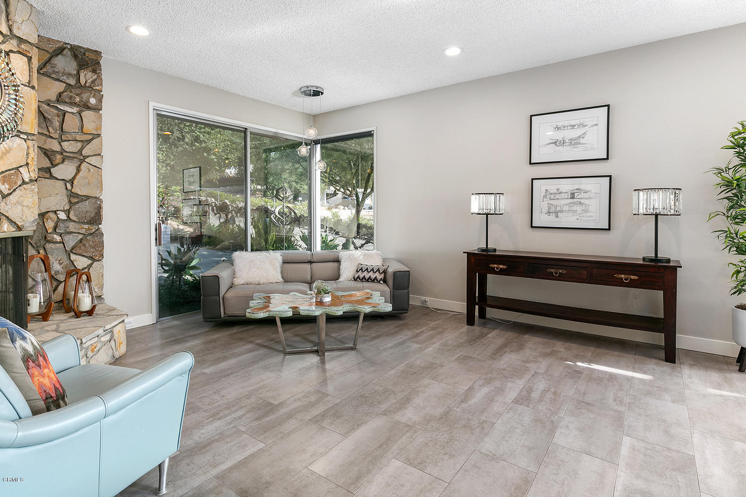 2044 Cricklewood Path Pasadena, CA 91107 - Photo 7 of 32 a living room with furniture and a large window