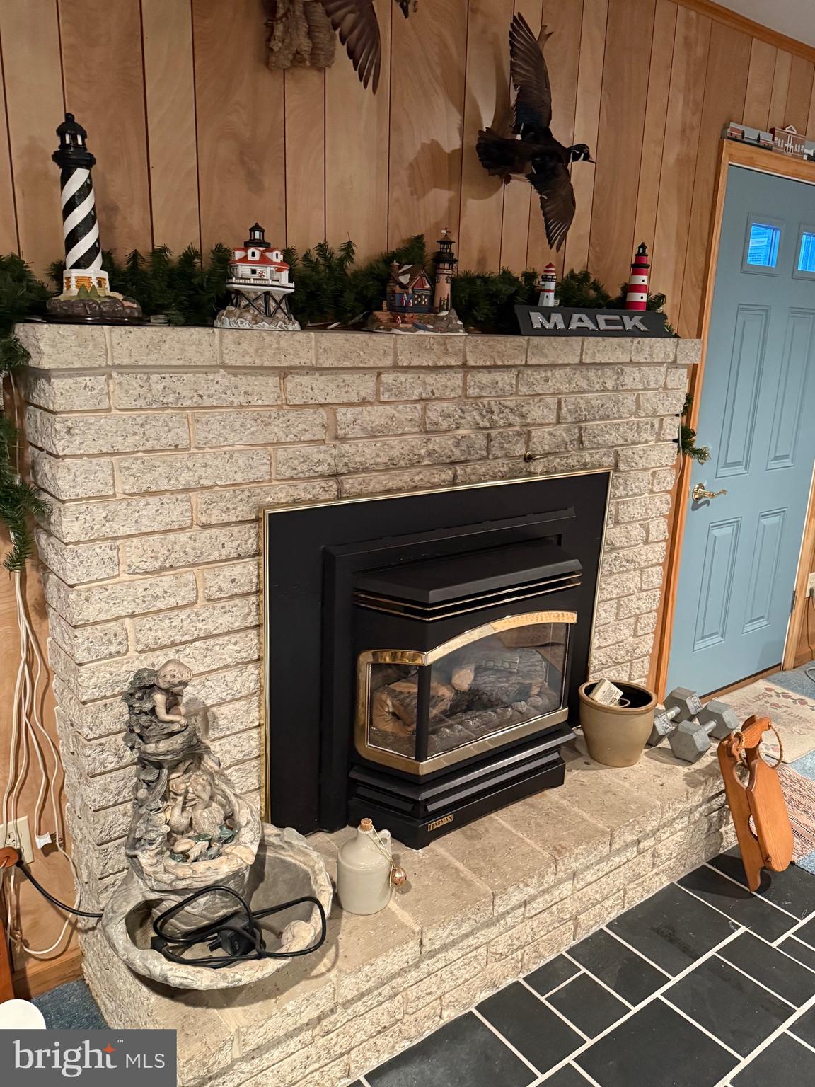 770 Forest Road Chambersburg, PA 17202 - Photo 13 of 27 a kitchen with granite countertop a stove and a wooden floor