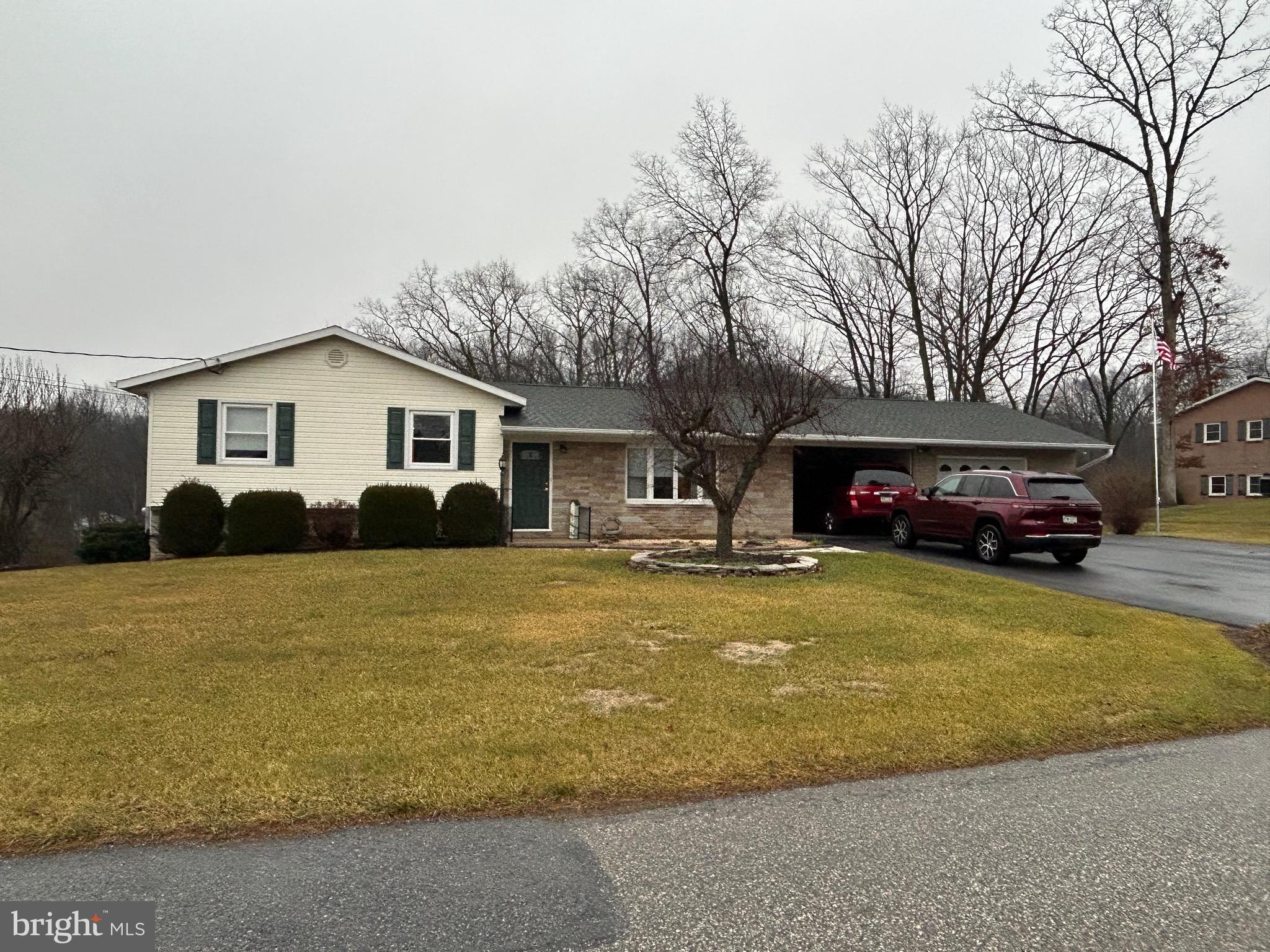 770 Forest Road Chambersburg, PA 17202 - Photo 26 of 27 a front view of a house with a yard and garage