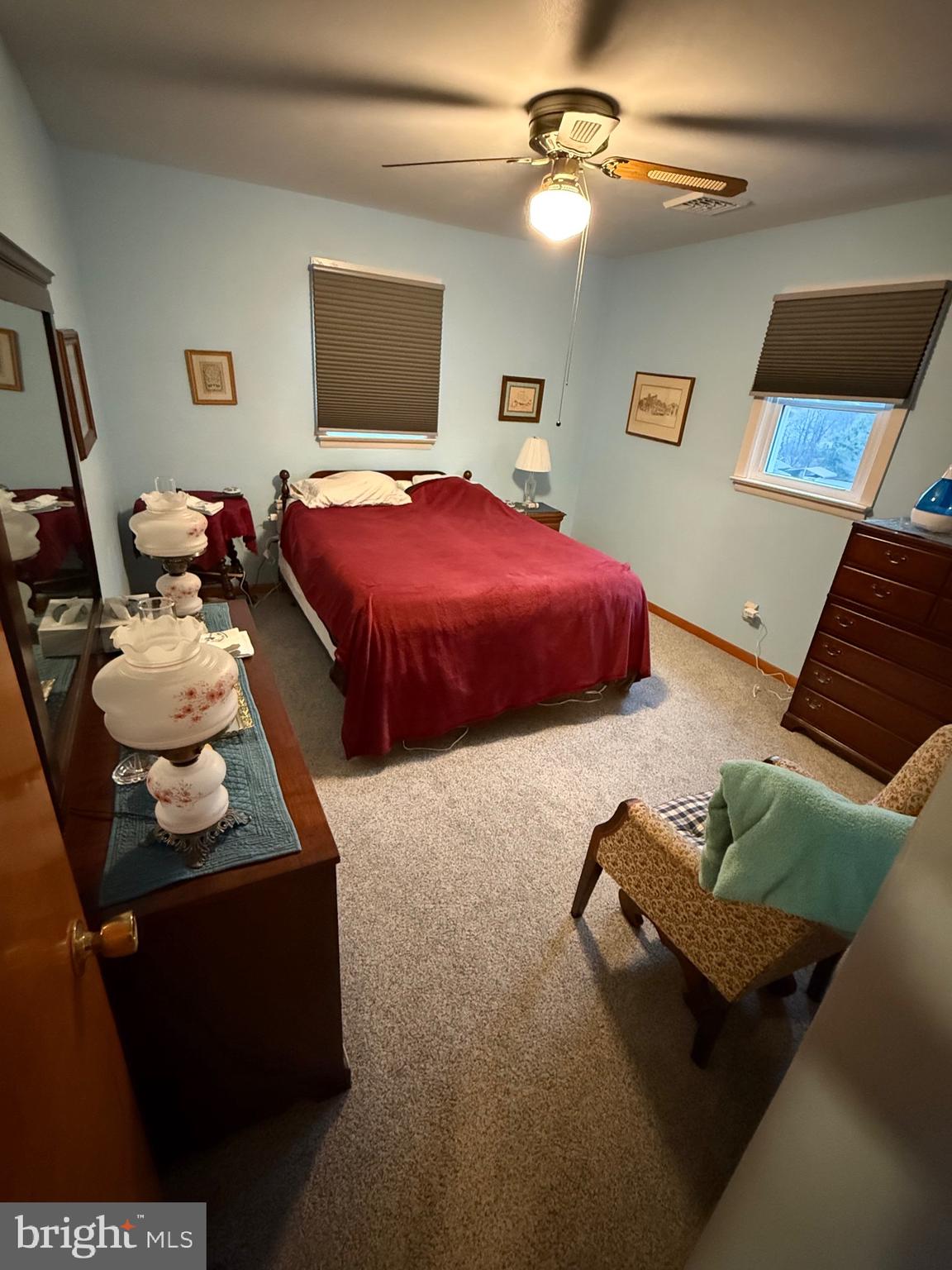 770 Forest Road Chambersburg, PA 17202 - Photo 27 of 27 a bedroom with bed and a chandelier