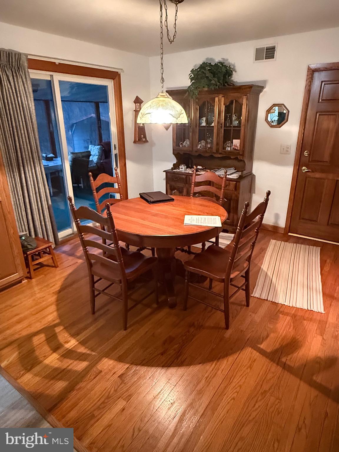 770 Forest Road Chambersburg, PA 17202 - Photo 6 of 27 a view of a dining room with furniture and wooden floor