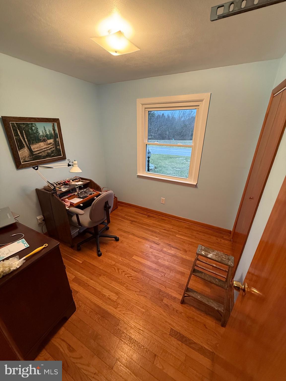 770 Forest Road Chambersburg, PA 17202 - Photo 9 of 27 a room with furniture and wooden floor