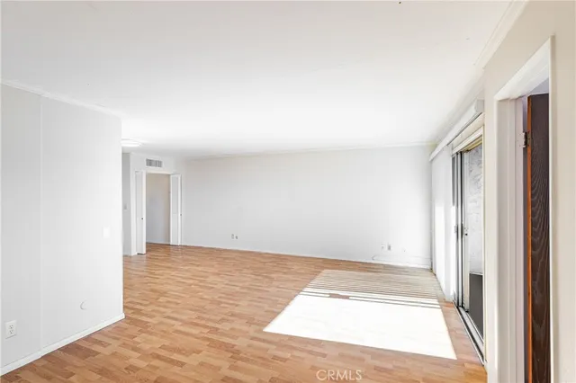 a view of an empty room and window