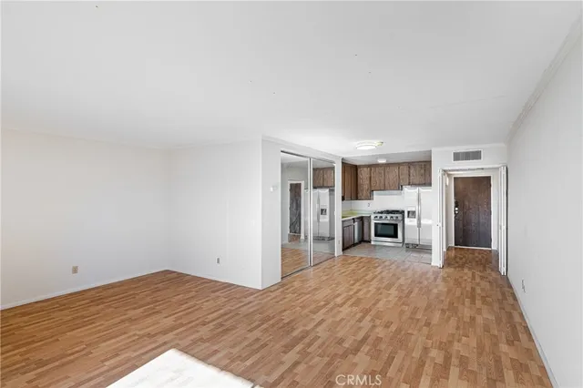 a view of a livingroom with wooden floor