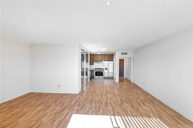 a view of a livingroom with wooden floor