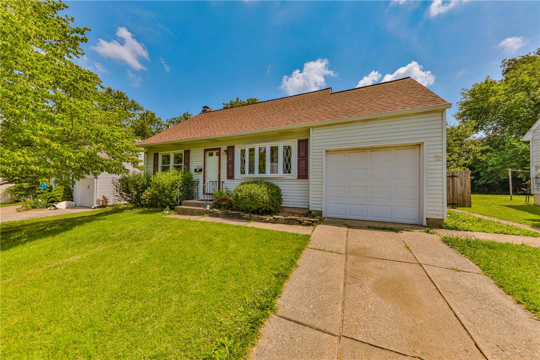 3050 Cornwall Road Bethlehem, PA 18017 - Photo 2 of 80 A classic ranch home showcasing a neat yard, a welcoming front entry, and an integrated garage.