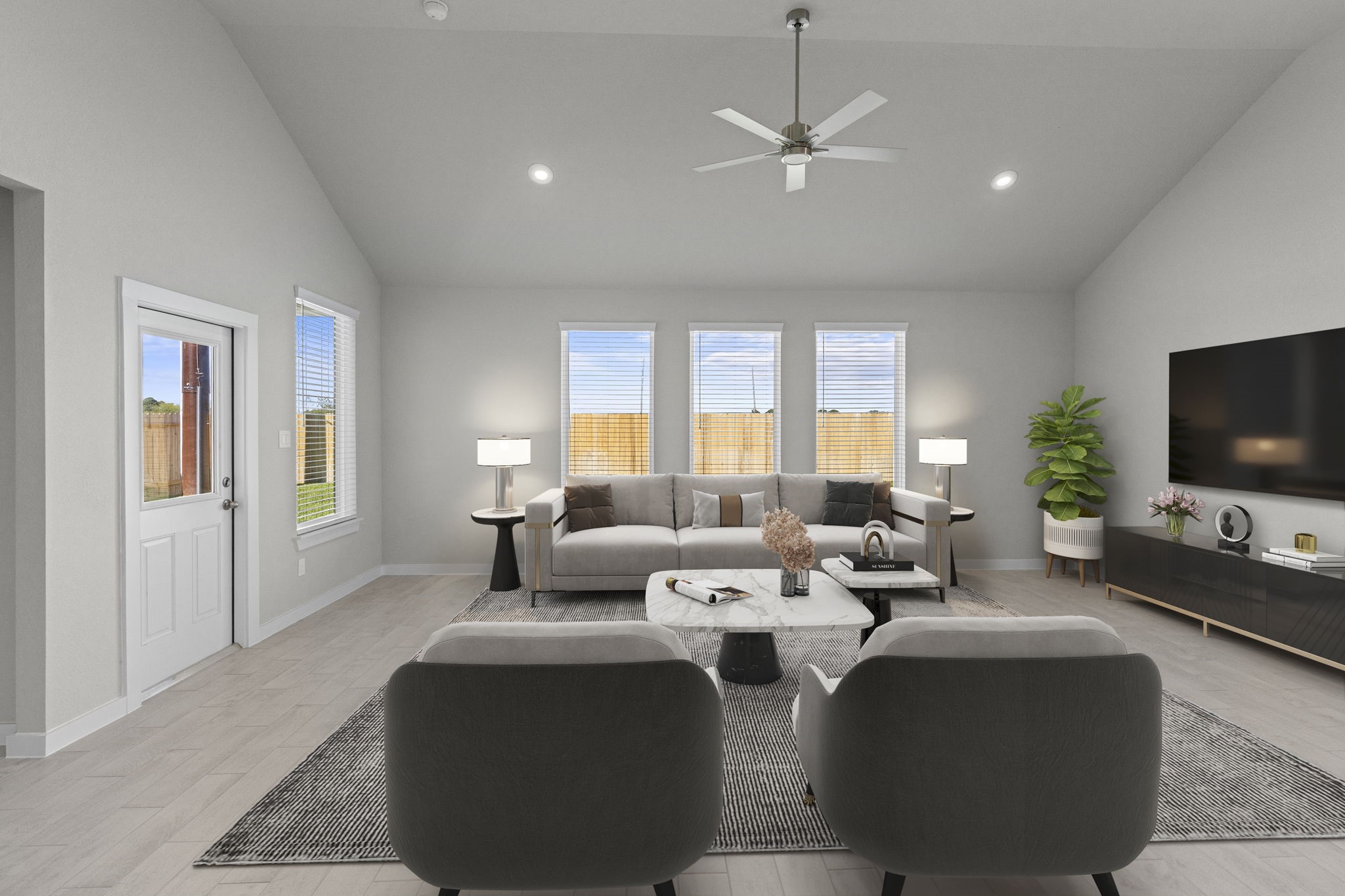 3102 Boulder Ridge Drive Rosenberg, TX 77471 - Photo 11 of 47 a living room with large couches and flat screen tv