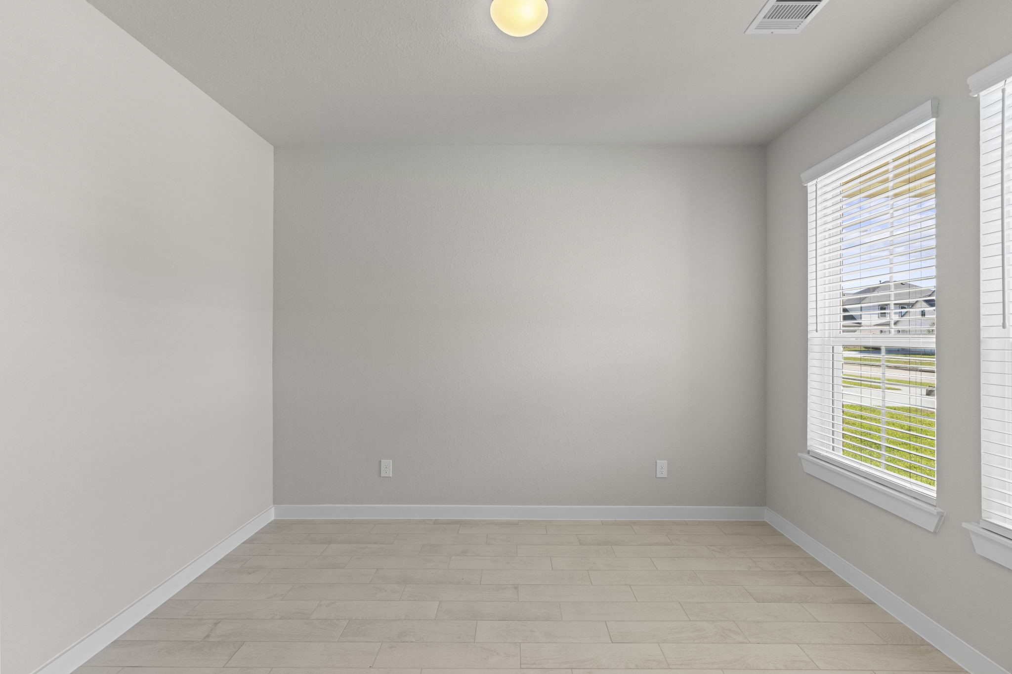 3102 Boulder Ridge Drive Rosenberg, TX 77471 - Photo 18 of 47 a view of an empty room with a window