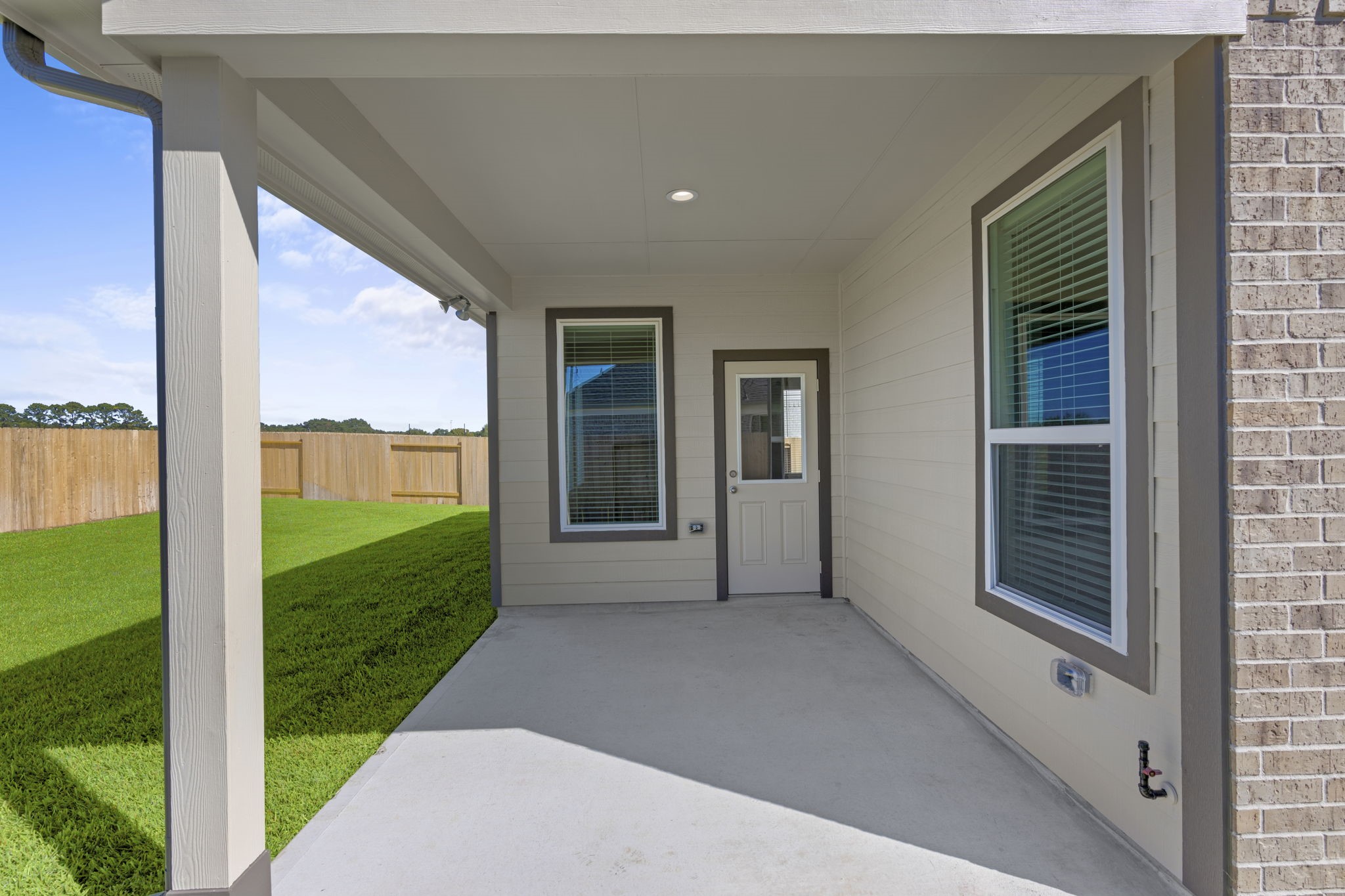 3102 Boulder Ridge Drive Rosenberg, TX 77471 - Photo 35 of 47 a view of a porch with a yard