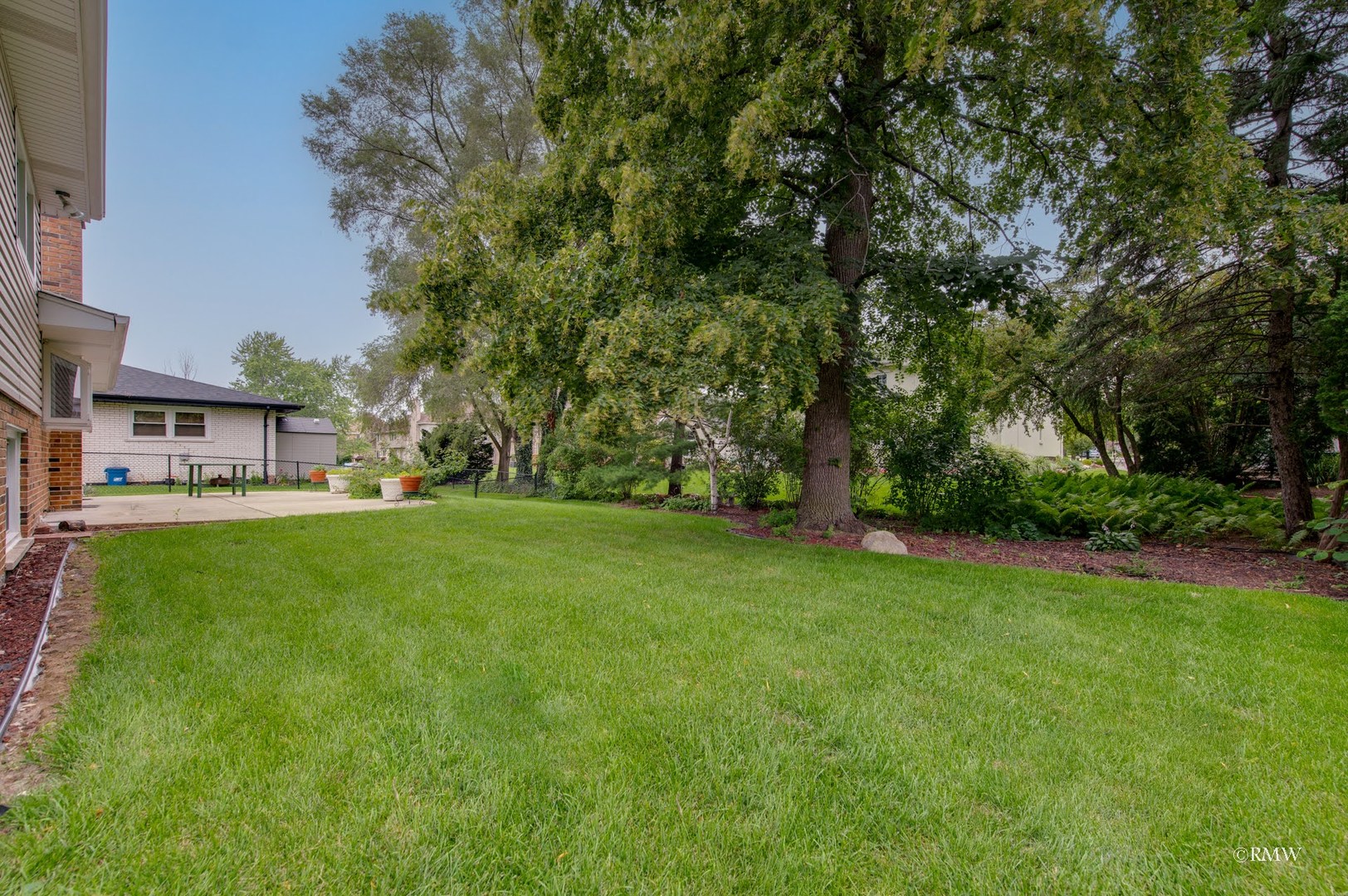 1906 McAdam Road Darien, IL 60561 - Photo 32 of 32 a view of yard with swimming pool and green space