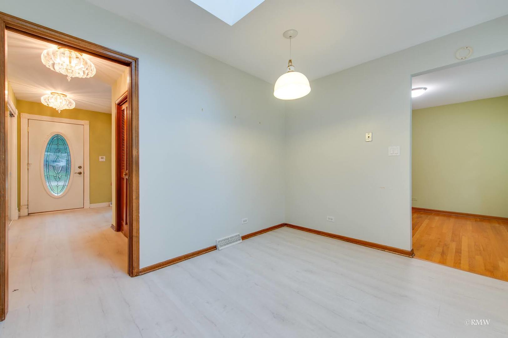 1906 McAdam Road Darien, IL 60561 - Photo 10 of 32 a view of an empty room and window