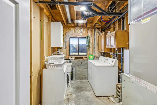 a view of living room with washer and dryer