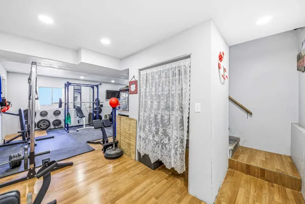 a view of a room with gym equipment
