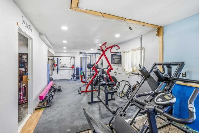 a view of a room with gym equipment