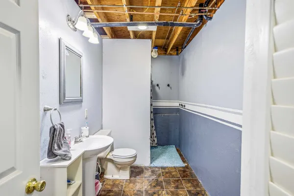 a bathroom with a sink and a toilet