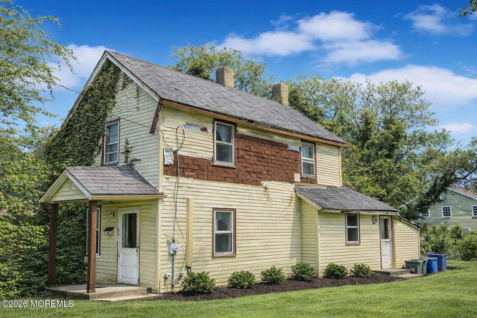 117 Laurel Street Long Branch, NJ 07740 - Photo 2 of 6 a view of a house with a yard