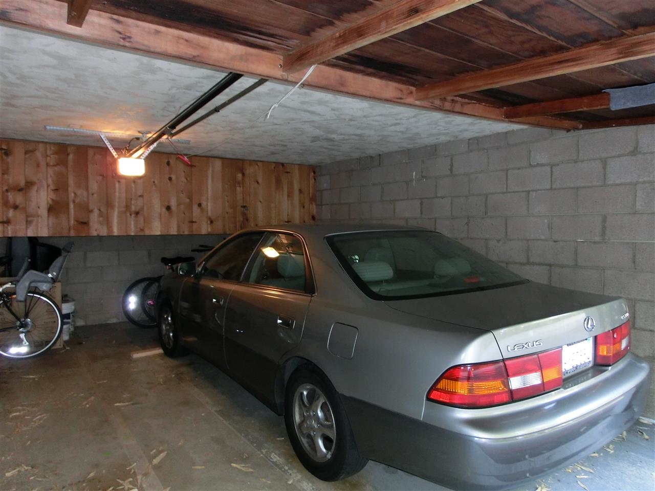 2352 Torrey Pines Road, Unit 2 La Jolla, CA 92037 - Photo 12 of 19 The garage is shared by 4 units and includes storage.