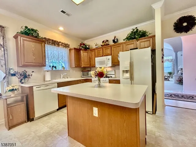 a bathroom with a sink a vanity and mirror