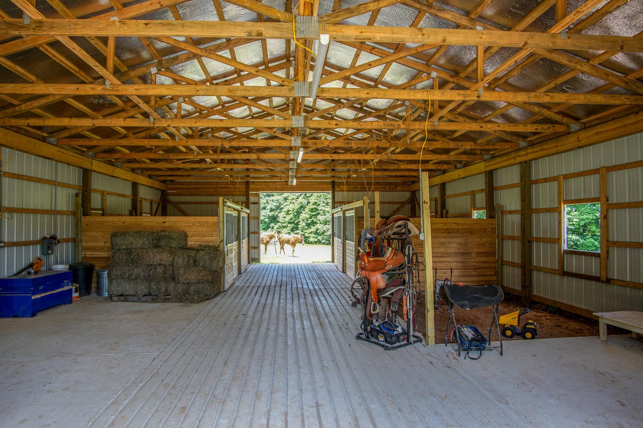 1035 Cheek Road Lewisburg, TN 37091 - Photo 11 of 30 Has water and electric with 4 stalls. Partial concrete floors-grooved.
