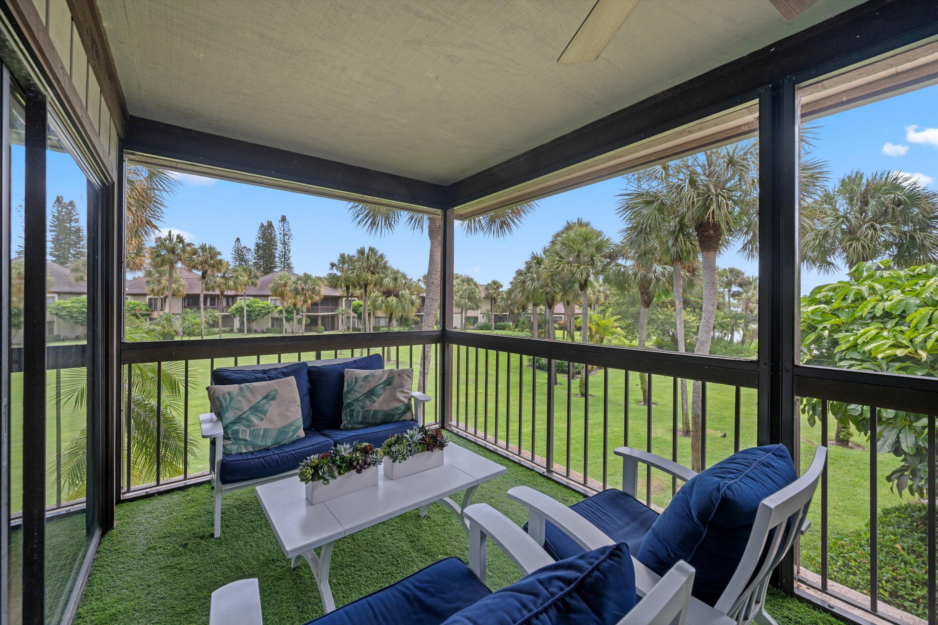 13400 Polo Road West, Unit 203 Wellington, FL 33414 - Photo 8 of 26 a view of a patio with furniture