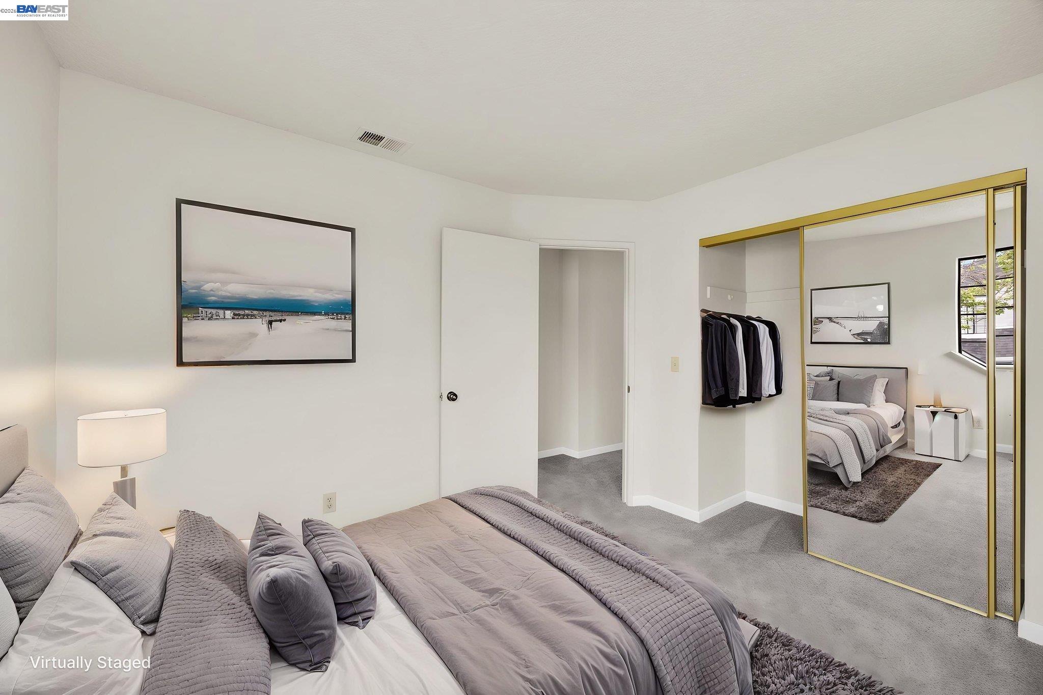 1068 Foster Street Alameda, CA 94502 - Photo 11 of 17 a bedroom with a bed and walk in closet