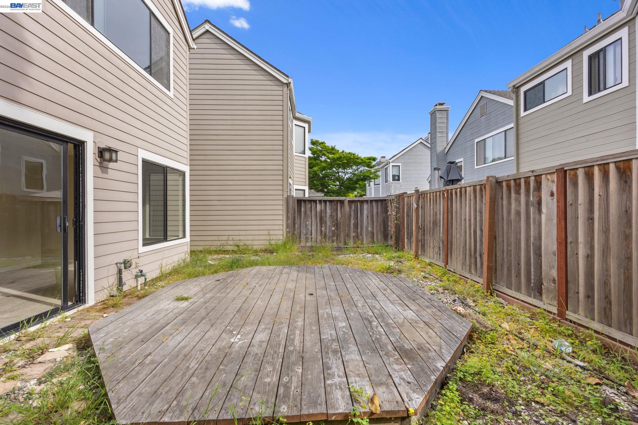 1068 Foster Street Alameda, CA 94502 - Photo 13 of 17 a backyard of a house