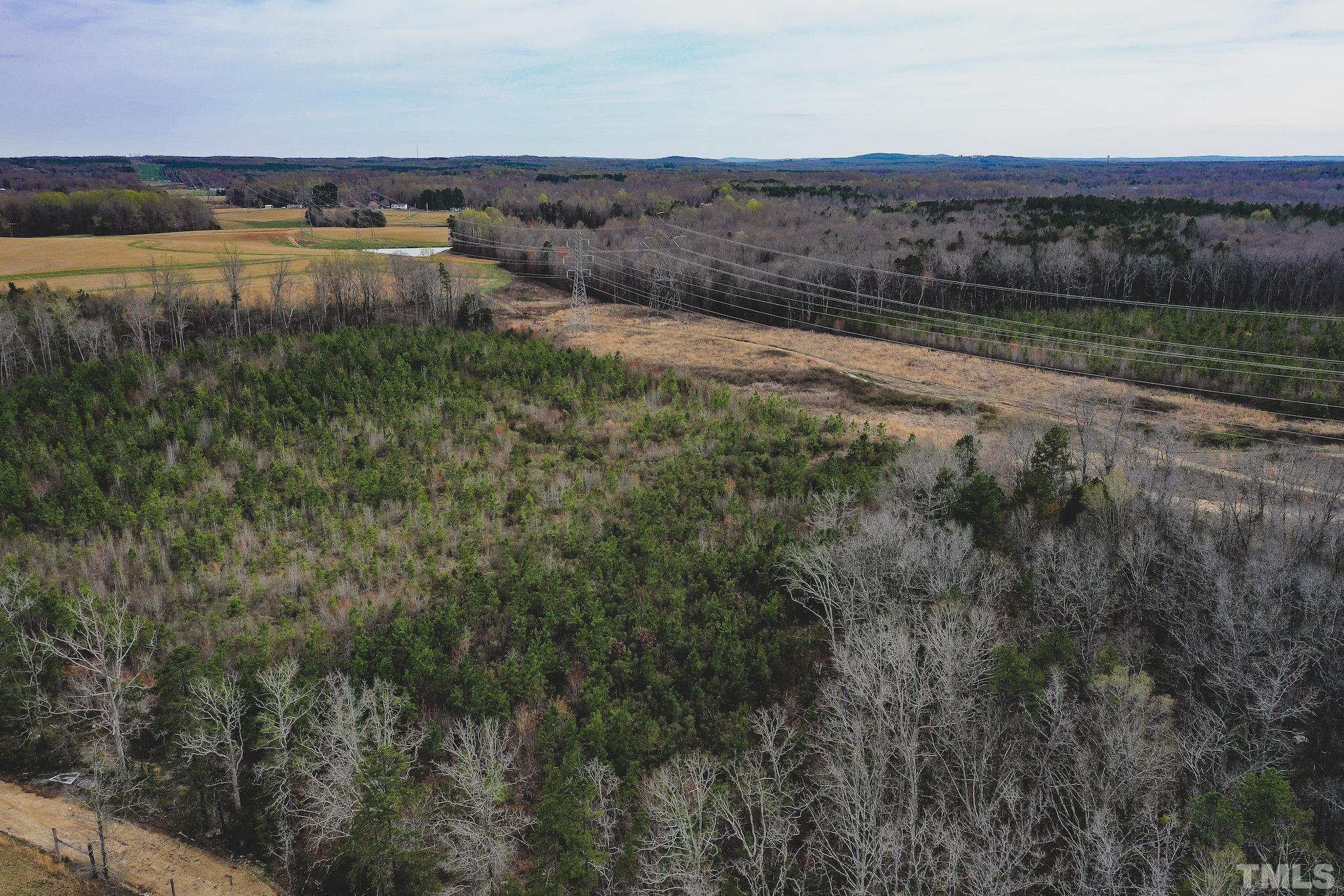 103-ac Pulliam-Tingen Mine Road Roxboro, NC 27574 - Photo 14 of 30 a view of a lake with an outdoor space