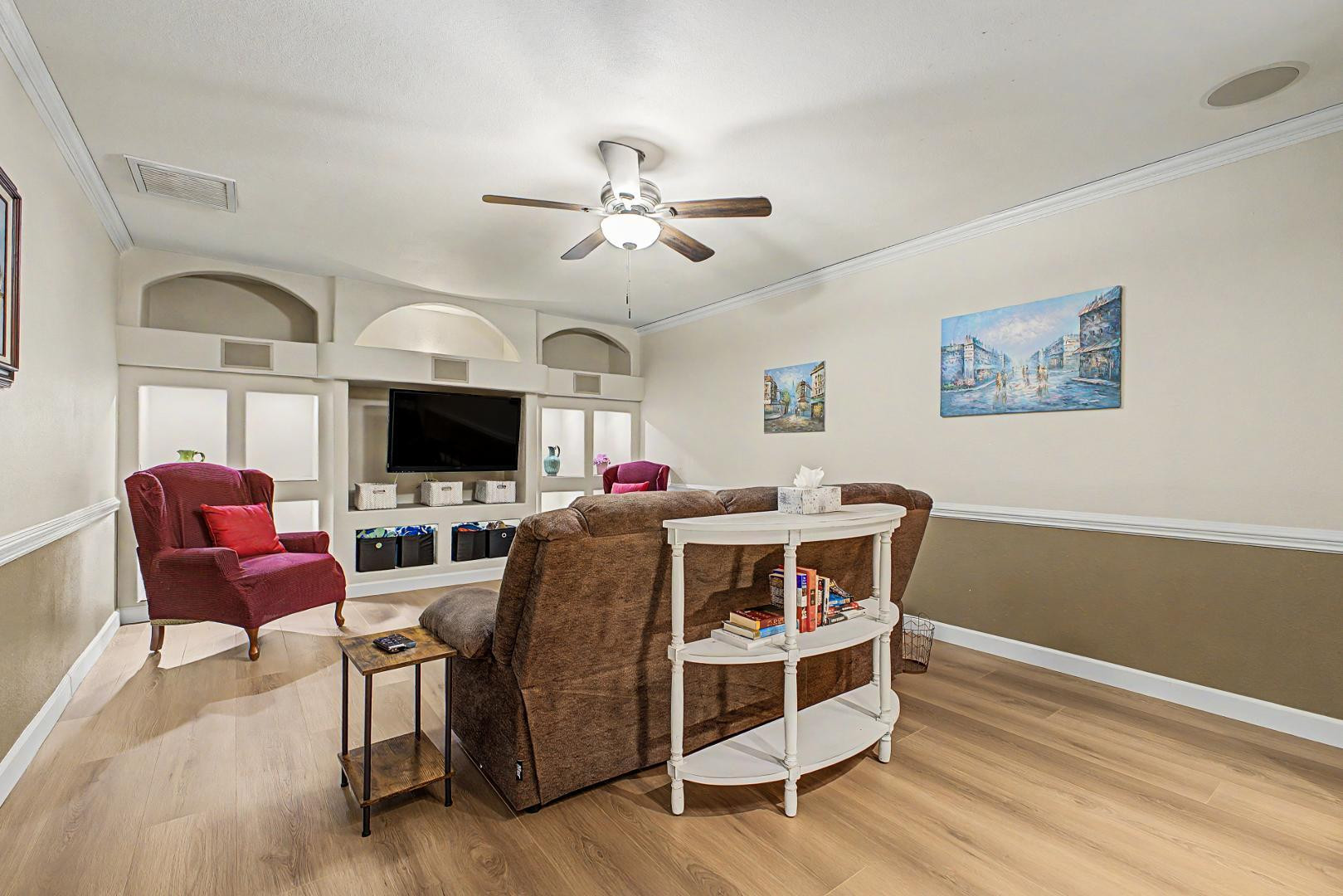 3346 East Cochise Road Phoenix, AZ 85028 - Photo 17 of 40 a view of a livingroom with furniture and a flat screen tv