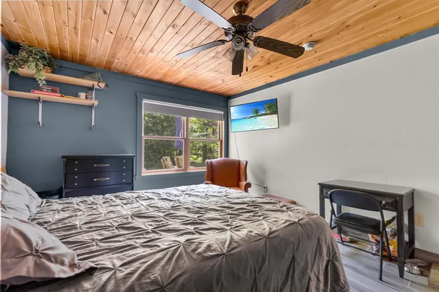 a bathroom with a sink a mirror and a bathtub
