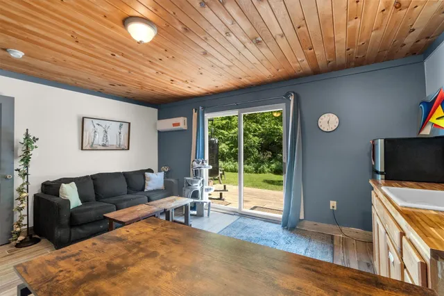 a living room with furniture and a table