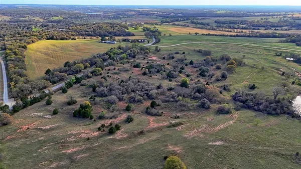 a view of a city with an ocean