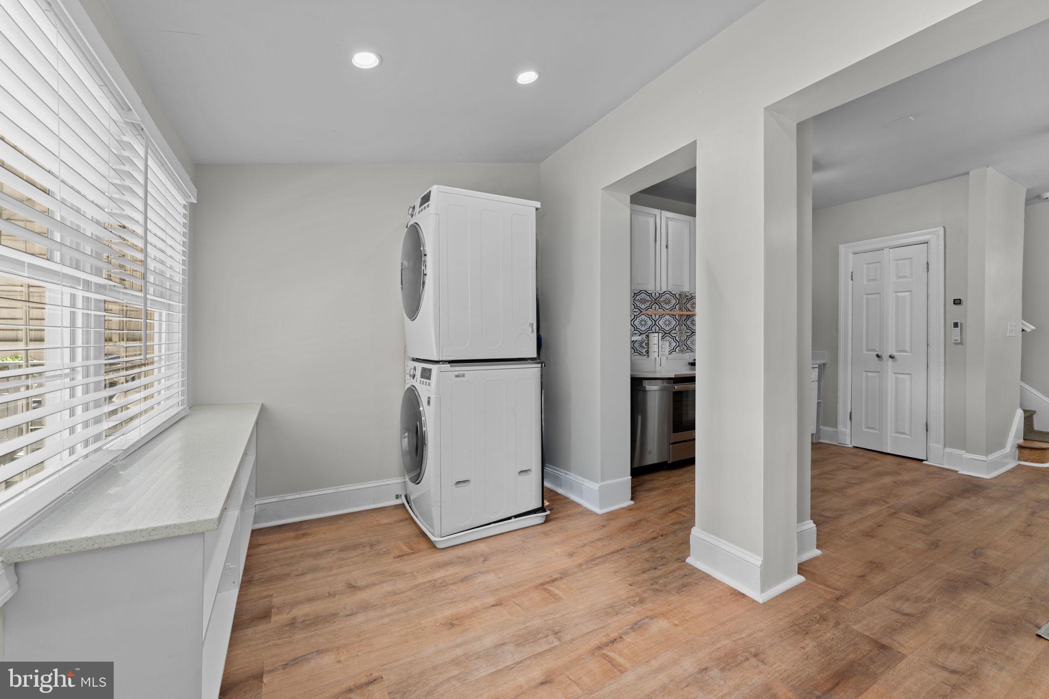 2339 3rd Street Northeast Washington, DC 20002 - Photo 13 of 59 Main level family room has full-size washer-dryer