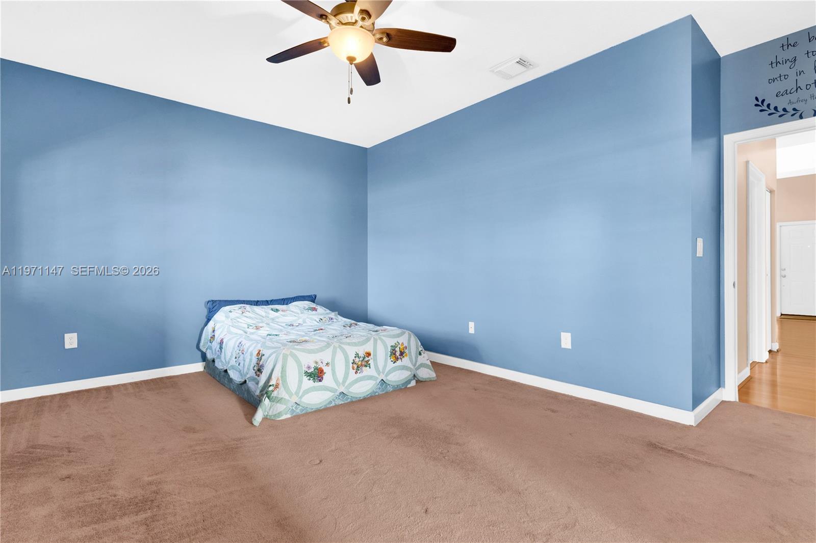 2875 Northeast 4th Street Homestead, FL 33033 - Photo 18 of 53 an empty room with a fan