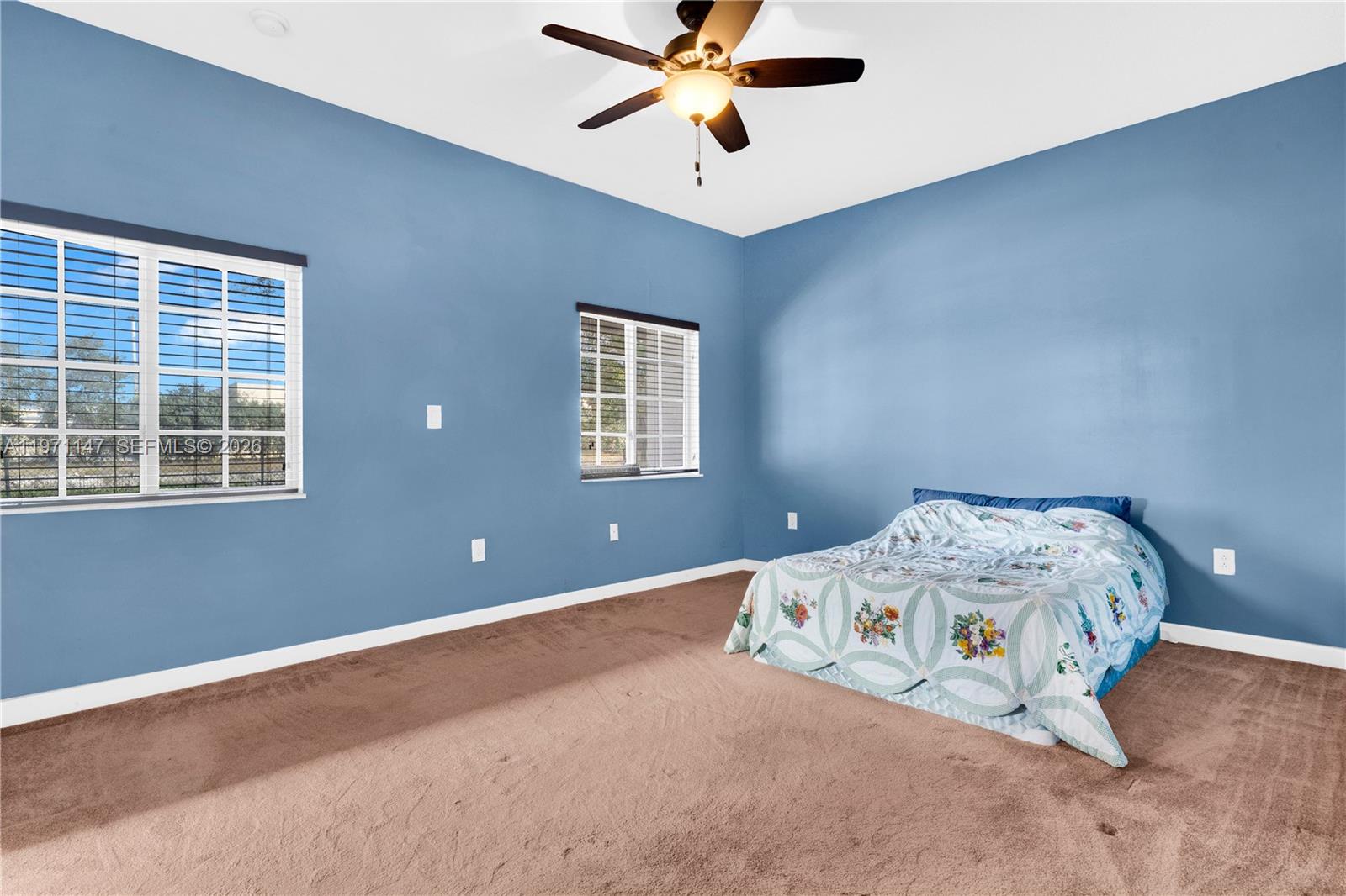 2875 Northeast 4th Street Homestead, FL 33033 - Photo 20 of 53 a bedroom with bed and window