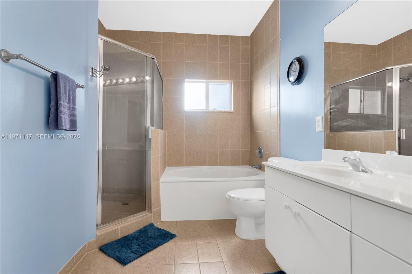 2875 Northeast 4th Street Homestead, FL 33033 - Photo 21 of 53 a bathroom with a sink a toilet and shower