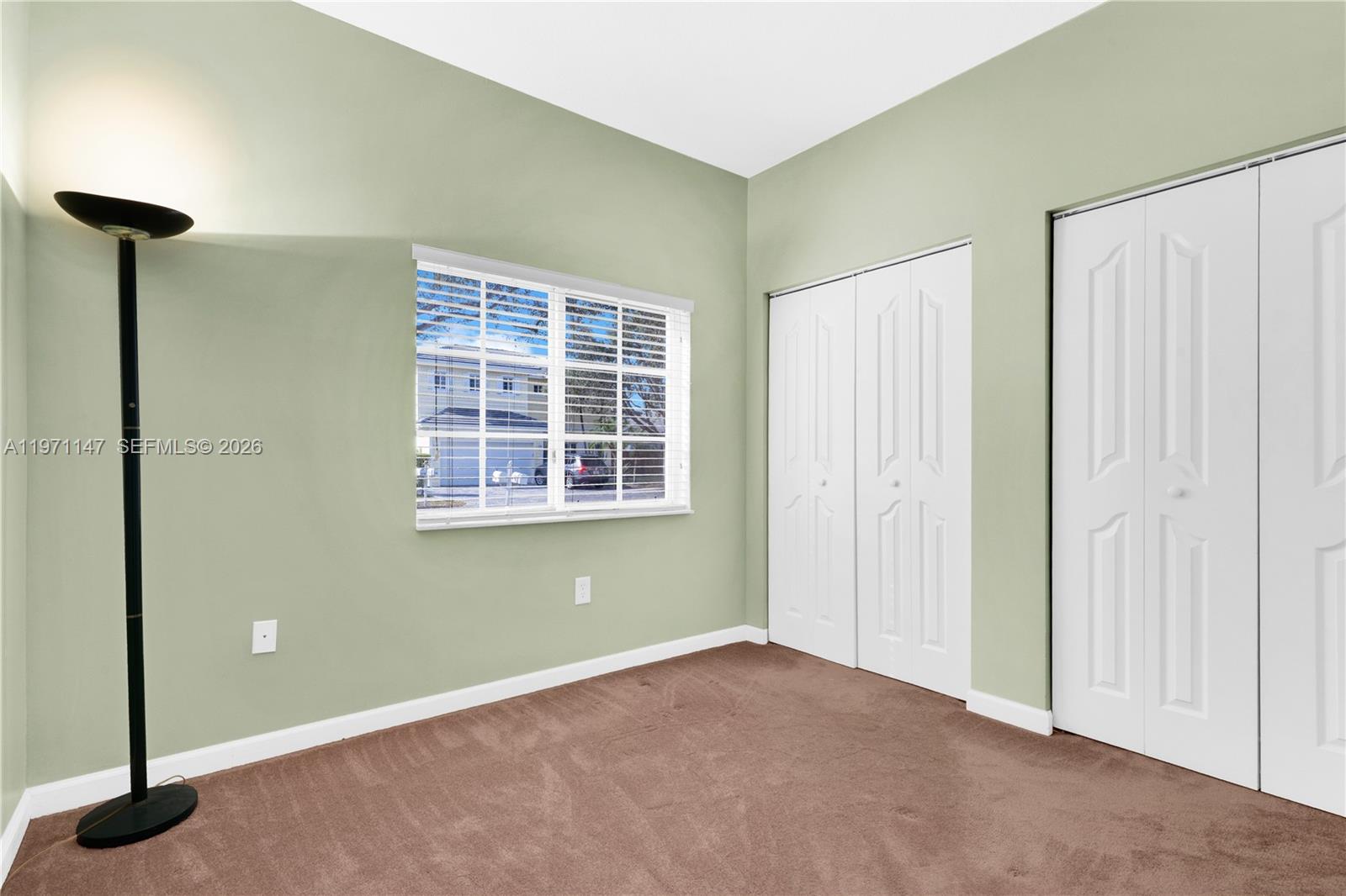 2875 Northeast 4th Street Homestead, FL 33033 - Photo 23 of 53 a view of an empty room with windows