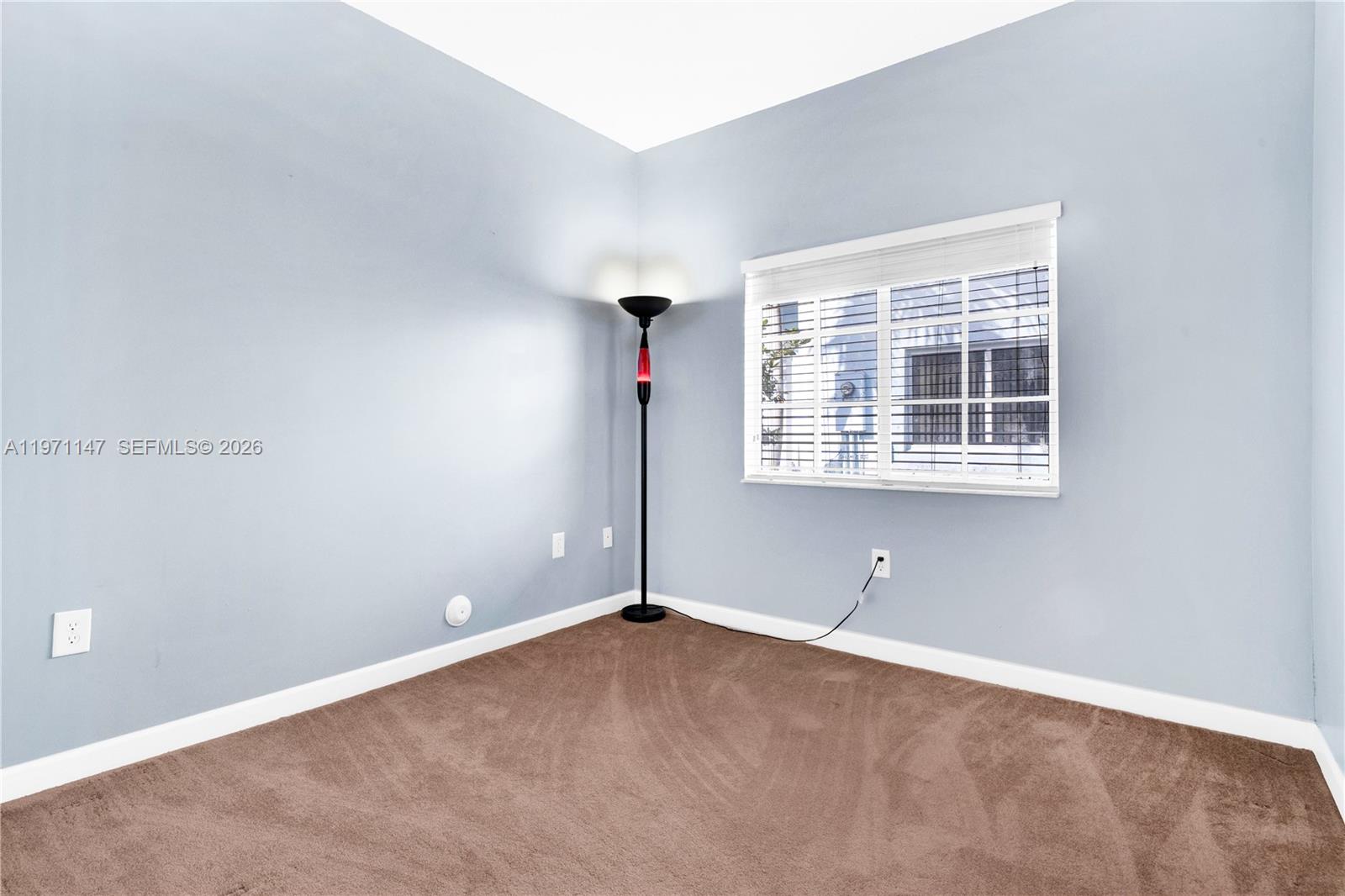 2875 Northeast 4th Street Homestead, FL 33033 - Photo 27 of 53 an empty room with windows