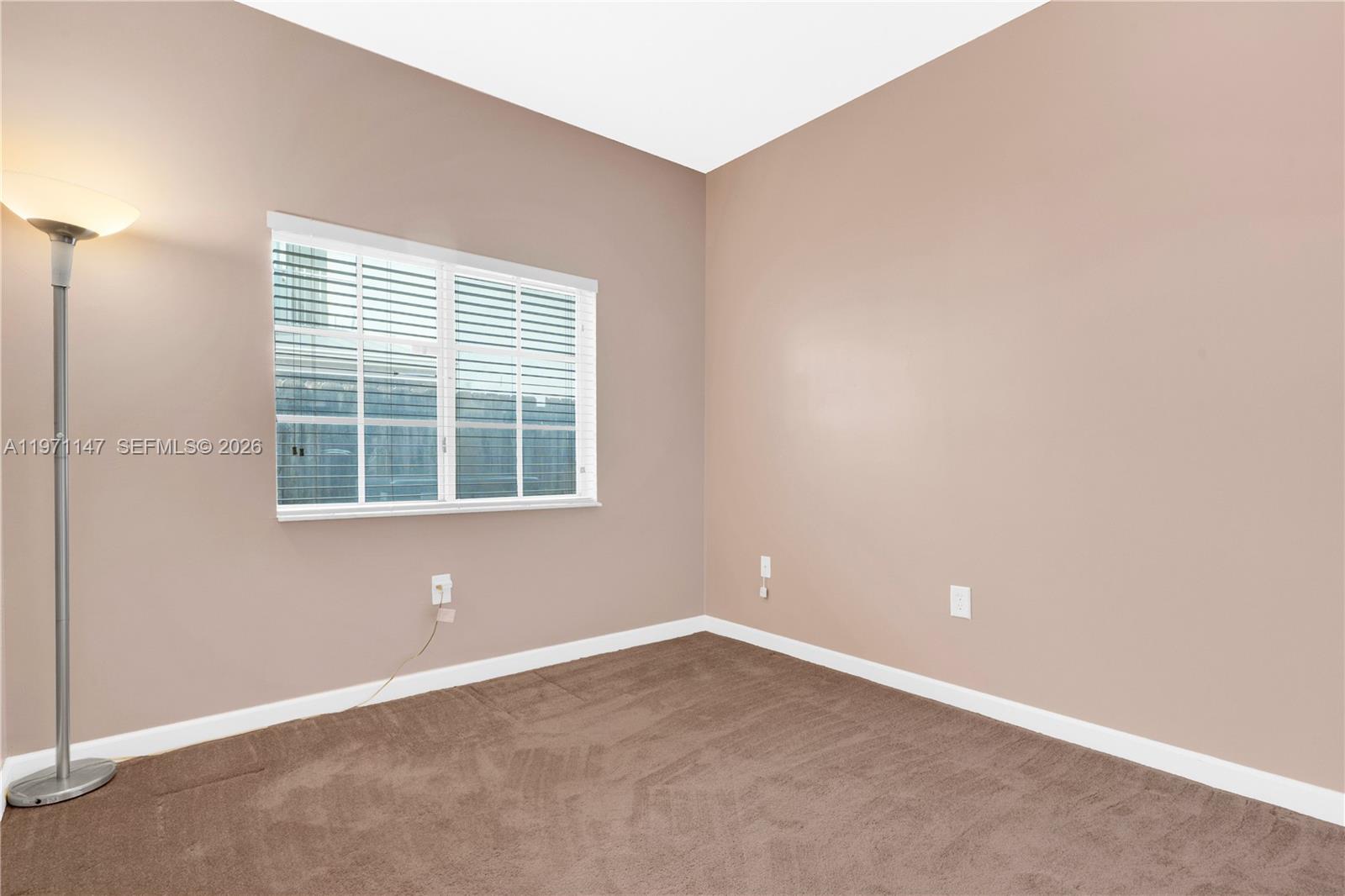 2875 Northeast 4th Street Homestead, FL 33033 - Photo 30 of 53 an empty room with a window