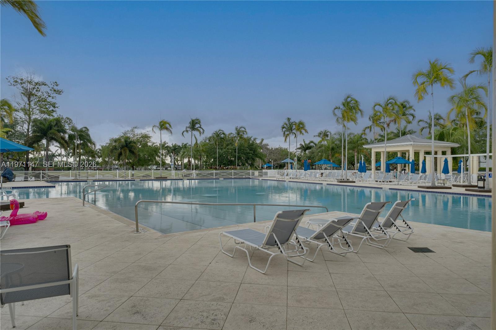 2875 Northeast 4th Street Homestead, FL 33033 - Photo 39 of 53 a view of lake with table and chairs
